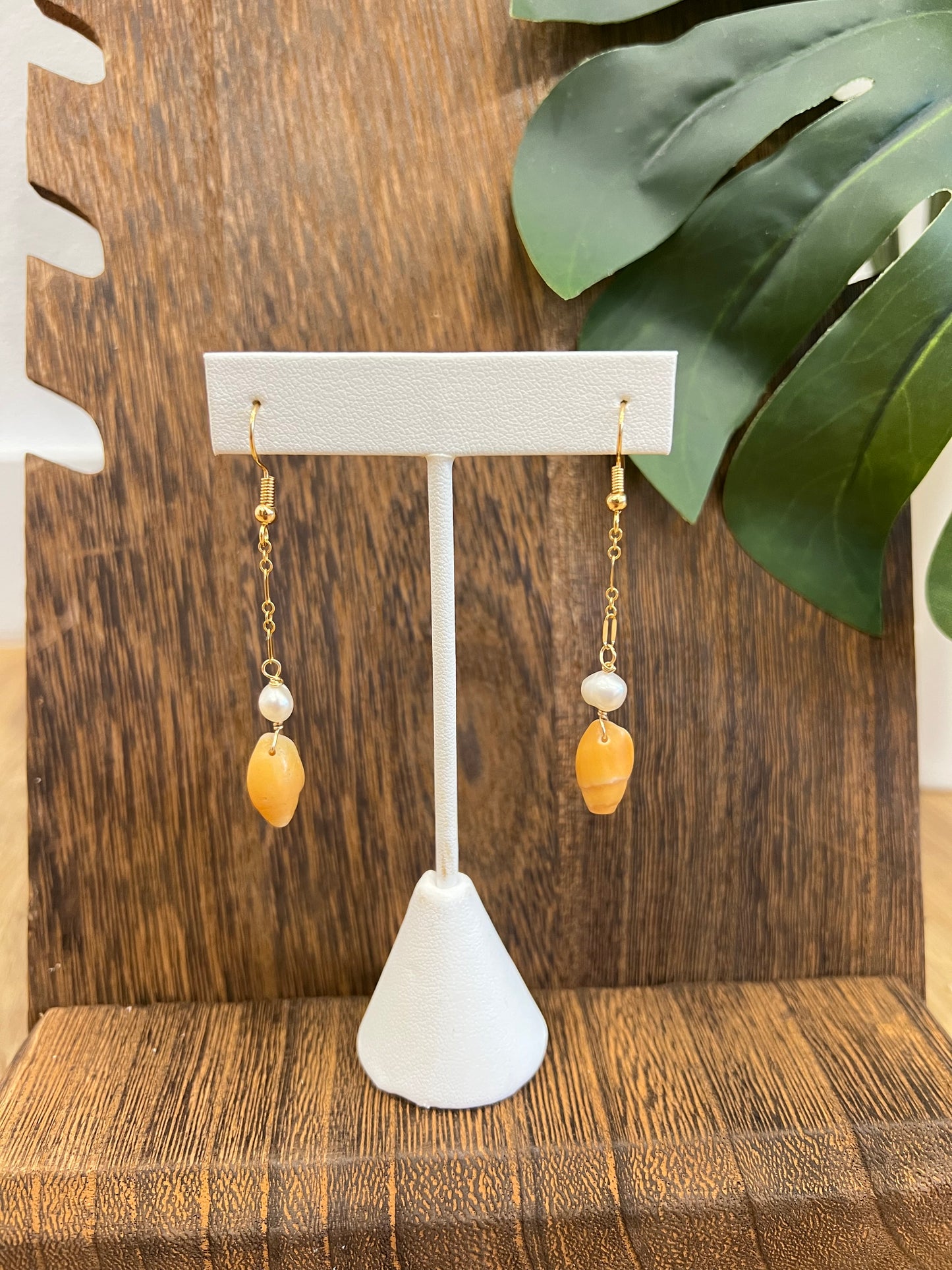 Golden shell dangles