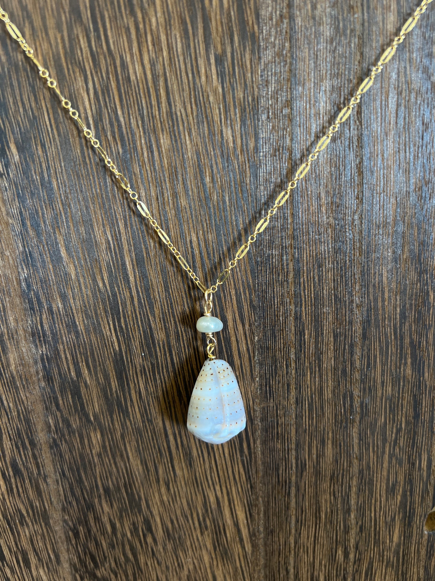 Abbreviated cone Necklace