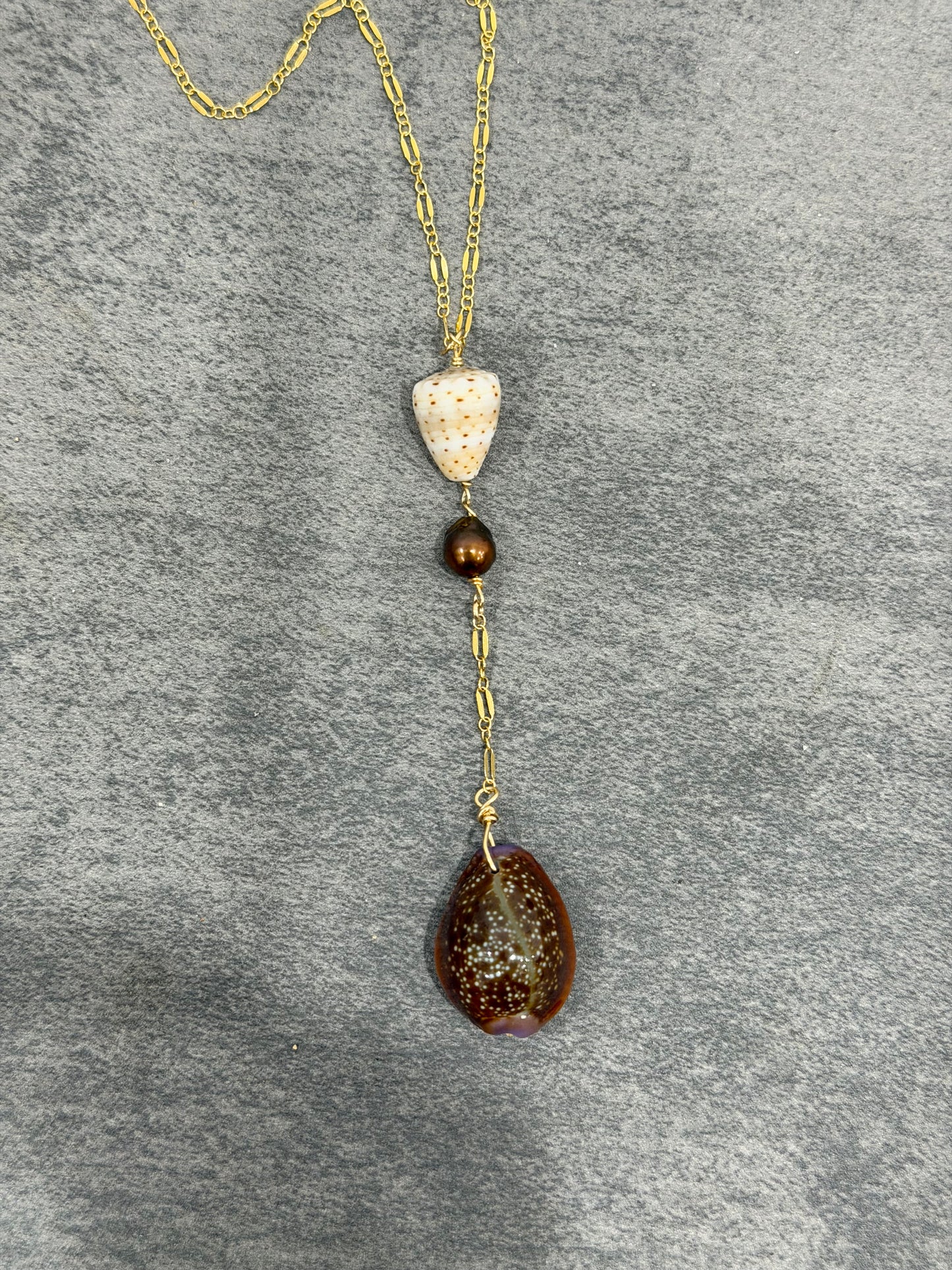 Dark cowrie drop necklace